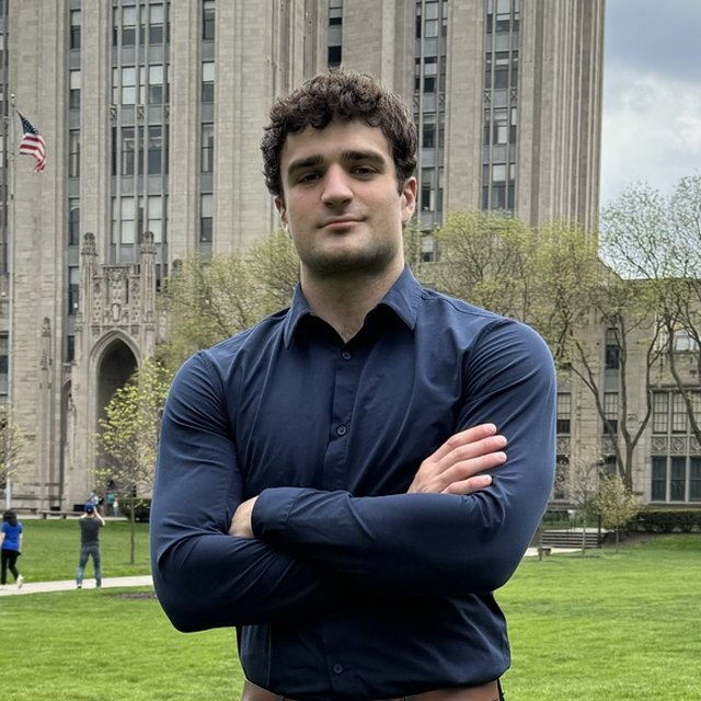 John Malagise in front of the Cathedral of Learning